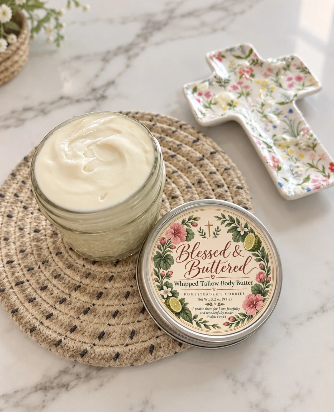 Blessed and Buttered whipped tallow body butter with its floral label