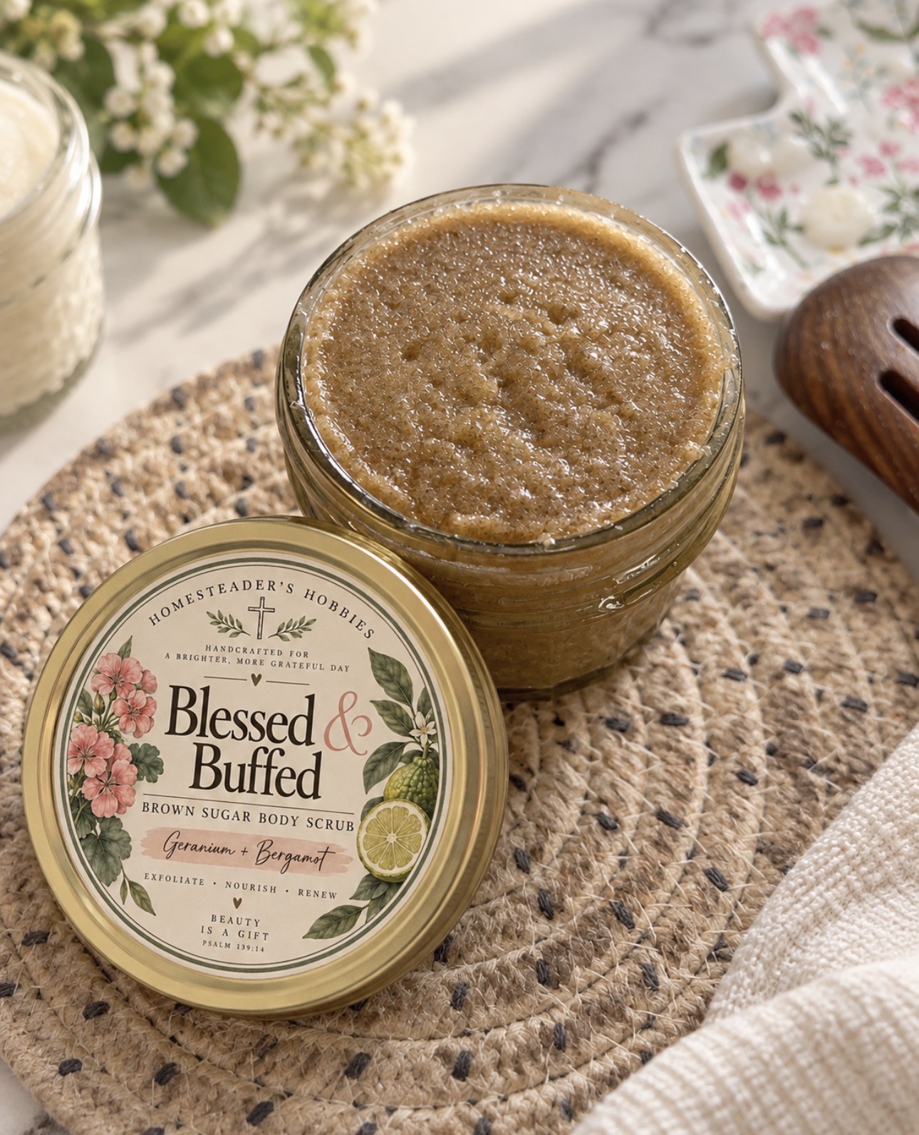 Blessed and Buffed brown sugar body scrub with its floral label