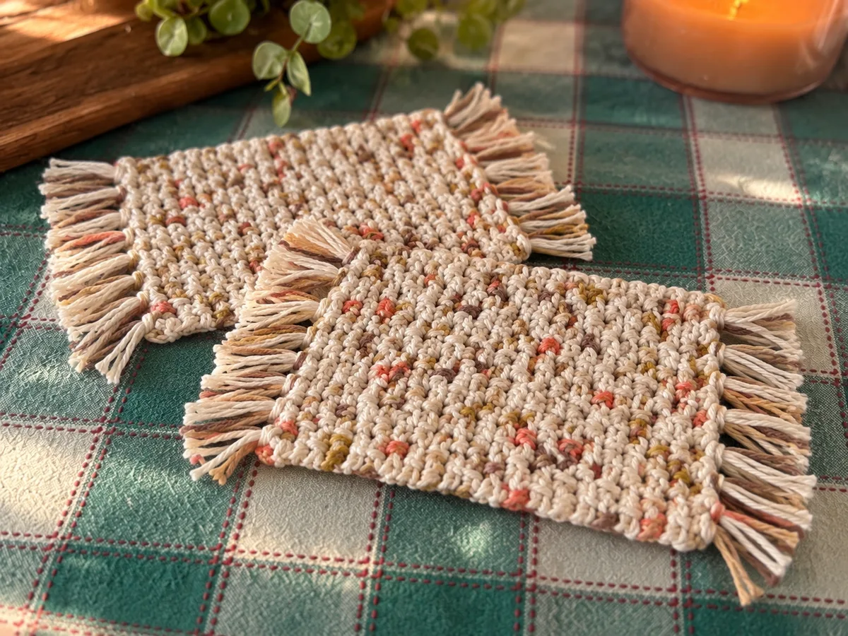 Oasis mug rug pair in cream with warm multicolored flecks