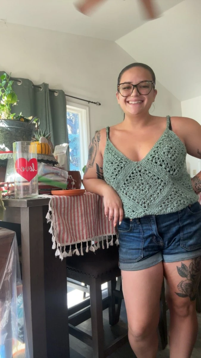 Mercedes wearing her sage green crochet tank